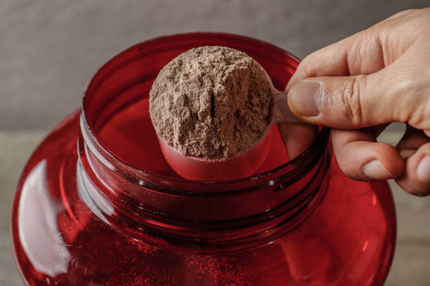 istock Whey protein powder supplement for after traning exercise 1176617805