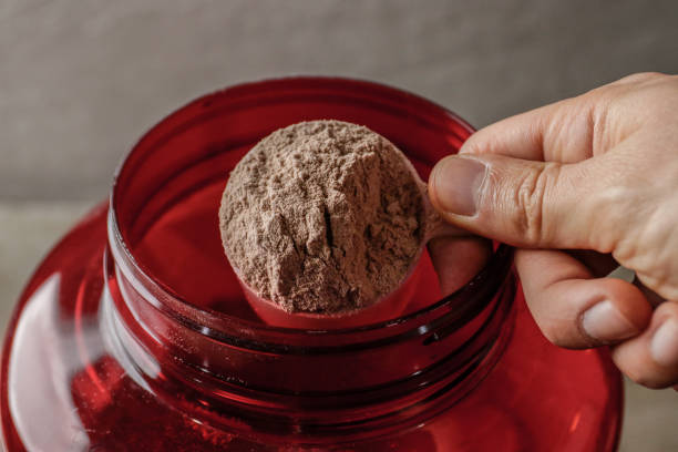 istock Whey protein powder supplement for after traning exercise 1176618013