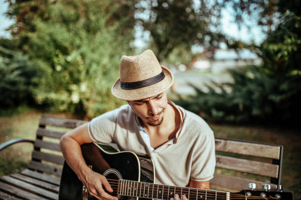 istock Musician playing acoustic guitar 1176618083