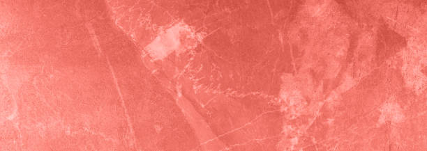 istock Coral color marble texture. Natural patterned stone for background, copy space and design. Abstract marble stone surface. 1176618949