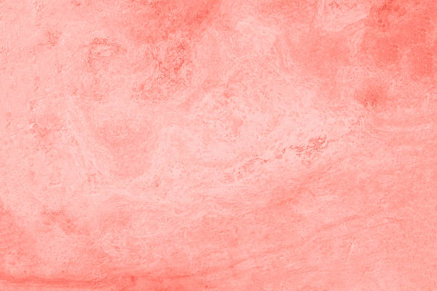 istock Coral color marble texture. Natural patterned stone for background, copy space and design. Abstract marble stone surface. 1176619037