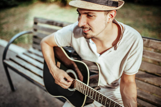 istock Musician playing acoustic guitar 1176619745