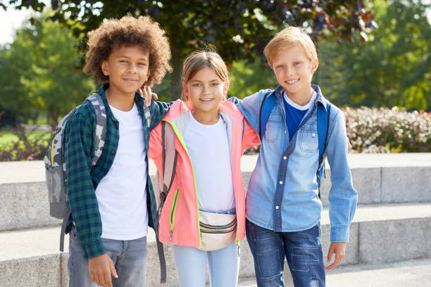 istock Friends standing in the park 1176620154