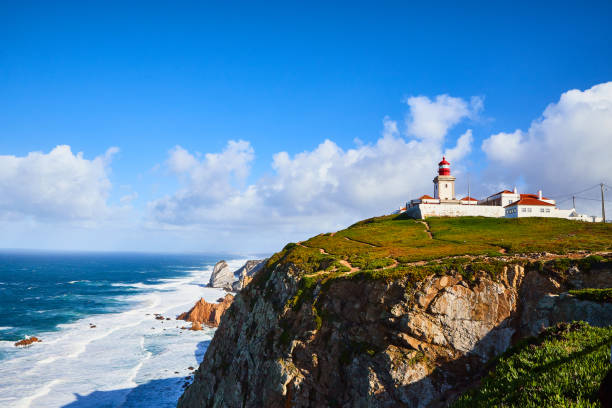 istock Cabo da Roca, Portugal. Lighthouse and cliffs over Atlantic Ocean, the most westerly point of the European mainland. 1176621616