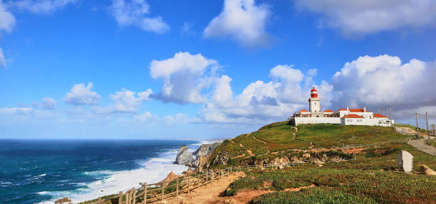 istock Cabo da Roca, Portugal. Lighthouse and cliffs over Atlantic Ocean, the most westerly point of the European mainland. 1176621617