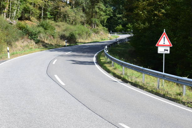 istock curvy country road 1176623247