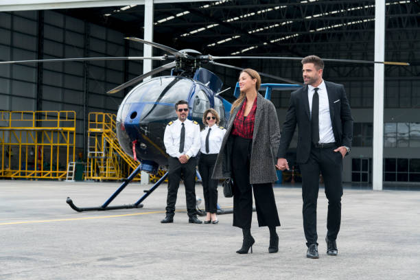 Couple getting off their helicopter