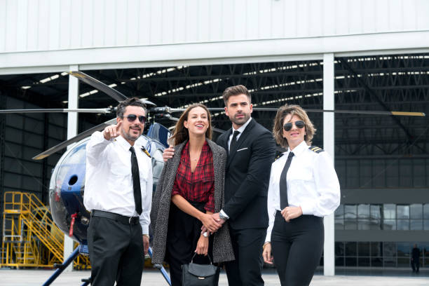 istock Couple getting off their helicopter 1176625430