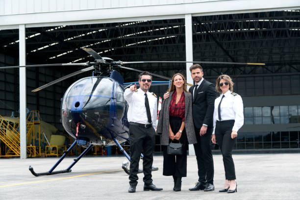 istock Couple getting off their helicopter 1176625453