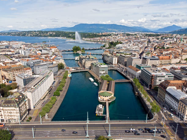 Aerial panoramic view of Geneva with fountain and lake Leman in the background, Switzerland Aerial panoramic view of Geneva with fountain and lake in the background, Switzerland geneva switzerland photos stock pictures, royalty-free photos & images