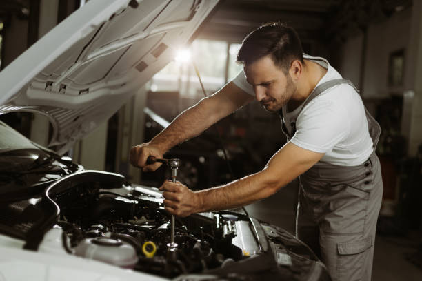 istock Auto mechanic repairing an engine 1176630395