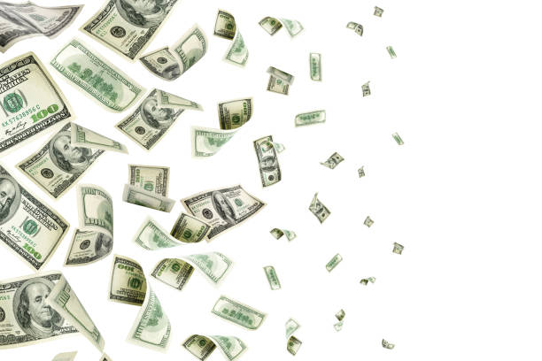 istock Hundred dollar bill. Falling money isolated background. American 1176634834