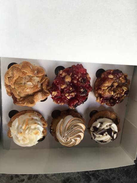 istock Desserts and cupcakes with Infused CBD Oil top down view 1176635540