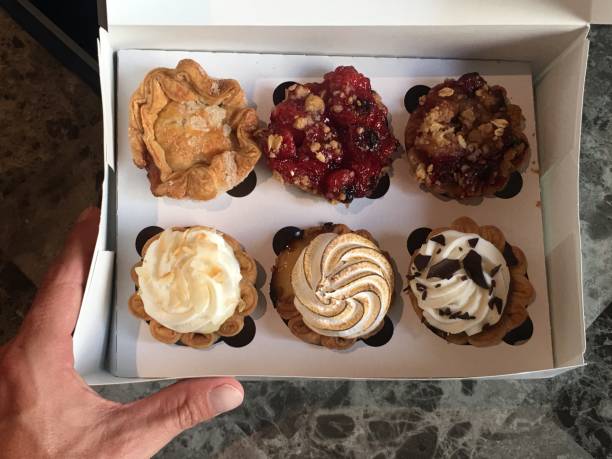 istock Desserts and cupcakes with Infused CBD Oil top down view 1176635544