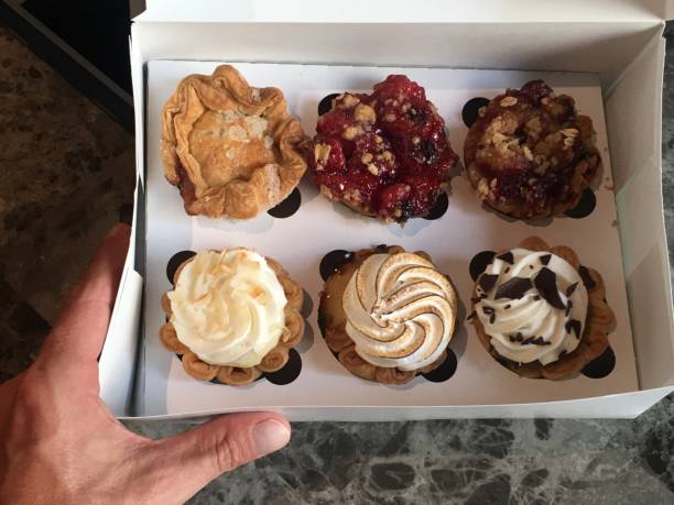istock Desserts and cupcakes with Infused CBD Oil top down view 1176635554