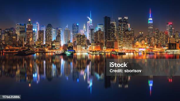 View On Manhattan At Night Stock Photo - Download Image Now - New York City, Night, Urban Skyline