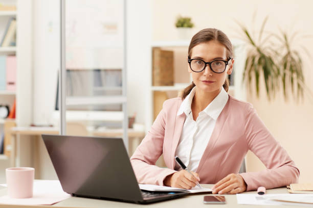 istock Woman working at office 1176637766