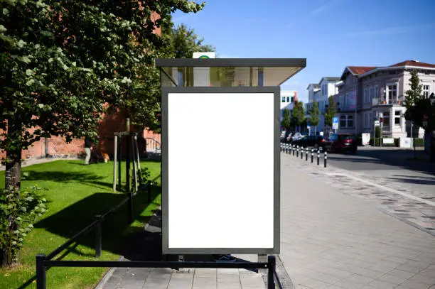 Blank bus stop advertising poster shot in Germany near Rostock at a bus stop. Perfect for visualising design or advertising concepts