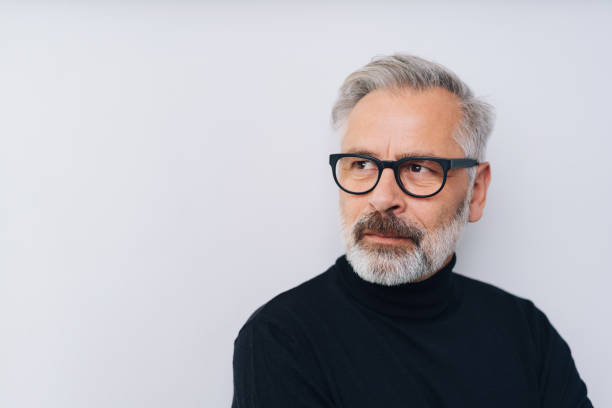 istock Middle-aged man thinking of future or planning 1176643348