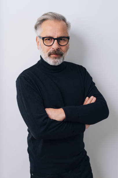 istock Bearded confident mature man with crossed arms 1176644039