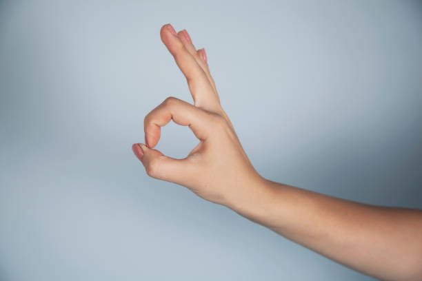 istock woman hand  okay sign 1176644479