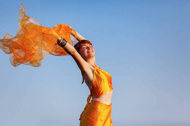 istock FREEDOM, MOVEMENTS, WOMAN ON A GATEWAY 1176645681
