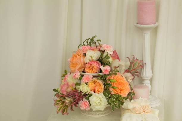 istock Festive table decoration with flowers at a wedding exhibition 1176645689