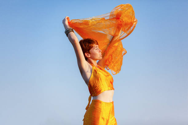 istock FREEDOM, MOVEMENTS, WOMAN ON A GATEWAY 1176645775