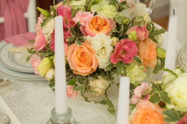 istock Festive table decoration with flowers at a wedding exhibition 1176645893