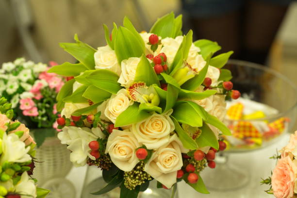 istock Festive table decoration with flowers at a wedding exhibition 1176646659