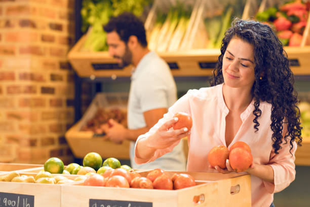 istock Family buying fruits 1176647662