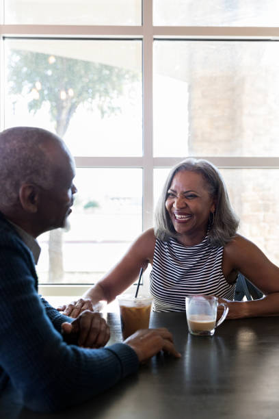 istock Active retired couple having coffee in cafe 1176649545