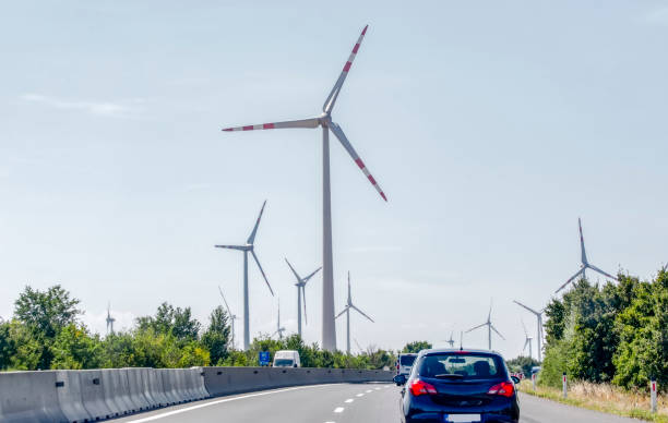 istock Wind turbines with power line in the sunset 1176649977