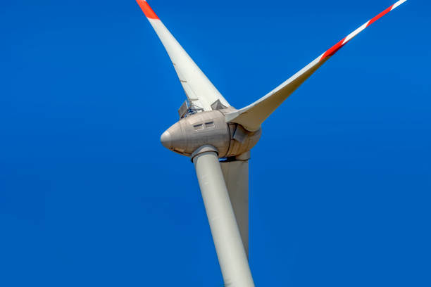 istock Wind turbines with power line in the sunset 1176650952