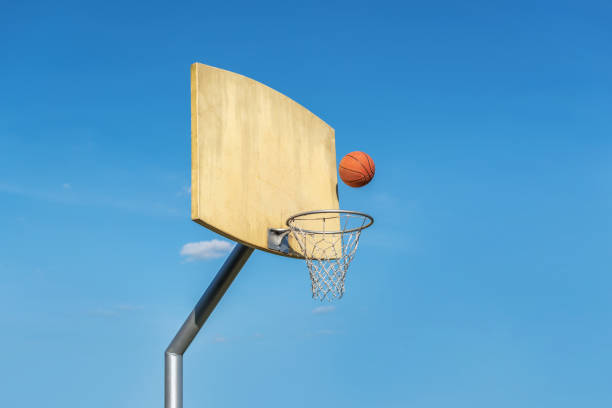 istock Basketball flies into the basketball ring. 1176654885