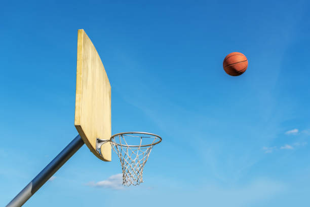 istock Basketball flies into the basketball ring. 1176654915