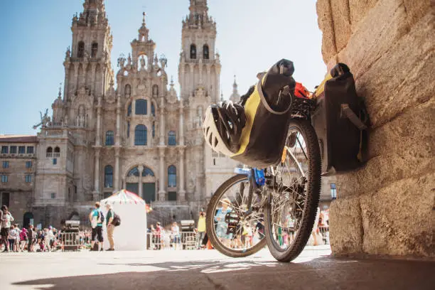 Bicycle by Santiago de Compostela Cathedral in Galicia, Spain. This church is the finish of the 'Camino de Santiago' (Santiago Path) pilgrimage route, which some pilgrims decide to take by bike.