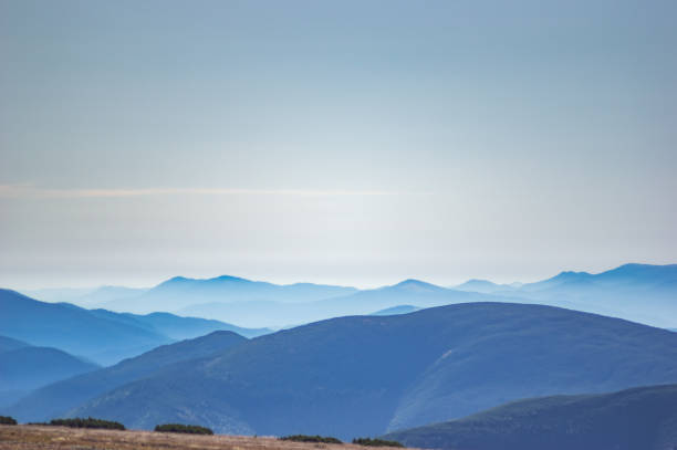 istock Mountains in the blue haze 1176661432