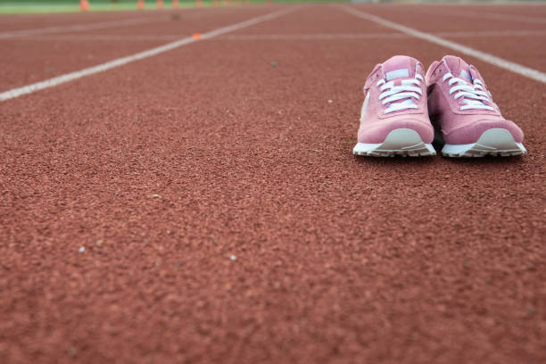 istock Running shoes on the track 1176661746