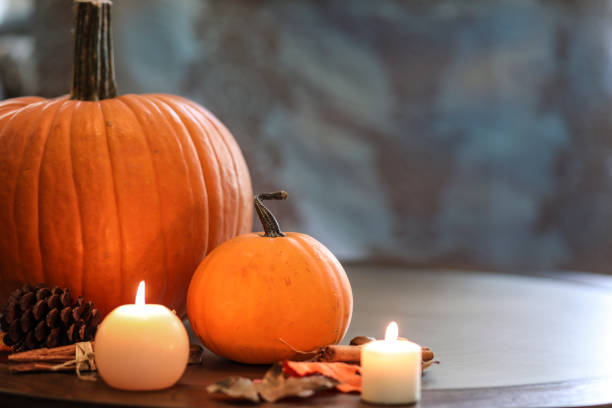 istock Halloween, autumn scene with pumpkins and candles. 1176662335
