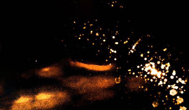 istock Black background with golden sparkles. Blurred  effect. Concept for festive background or for project 1176663707
