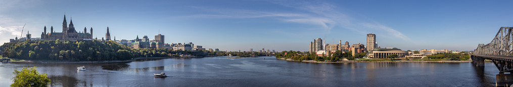 Panoramic view of Ottawa, Parliament hill, Gatineau, Victoria bridge and Outaouais river.
