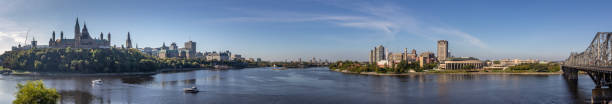 Panoramic view of Ottawa, Parliament hill, Gatineau,   Victoria bridge and Outaouais river. stock photo