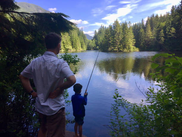 istock Boy fishing at Lake 1176664163
