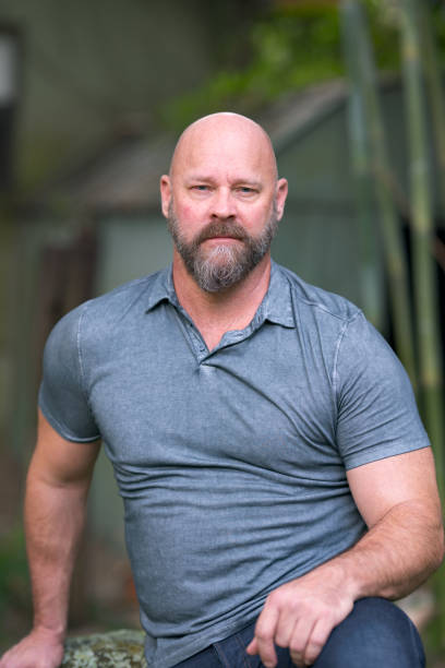 istock Handsome mature man with bald head and full beard 1176675592
