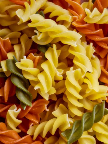 istock Pasta of various colors, dried noodles 1176679317