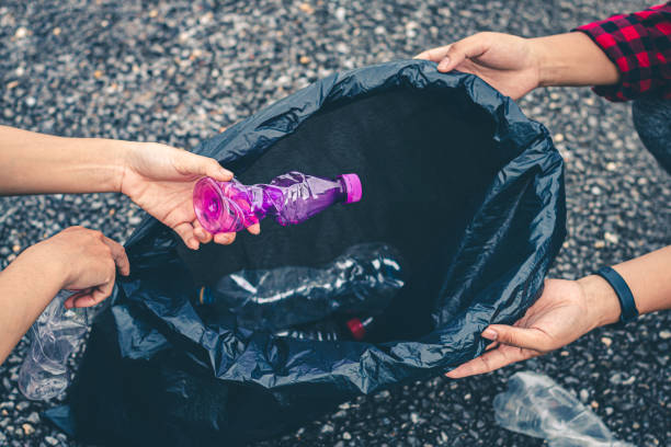 istock Women volunteer help garbage collection for to recycling environment. 1176682275