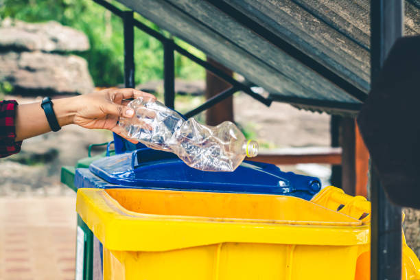 istock Women volunteer help garbage collection for to recycling environment. 1176682286