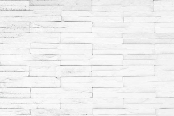 istock Wall white brick wall texture background in room at subway. Brickwork stonework interior, rock old clean concrete grid uneven abstract weathered bricks tile design, horizontal architecture. 1176689123