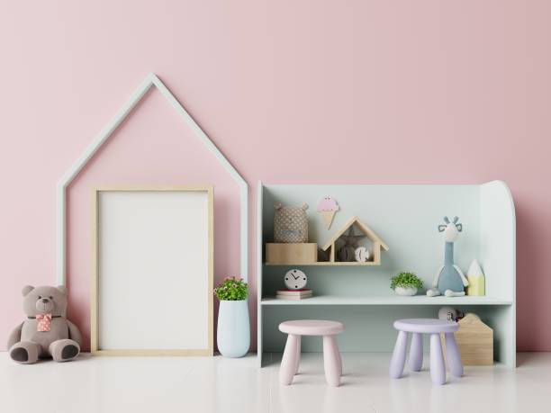 istock Mock up posters in child room interior on pink background. 1176689182